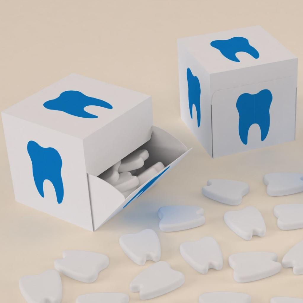 Impression of custom moulded dent shape mints in personalised cube box Custom moulded mints in dent tooth shaped logo